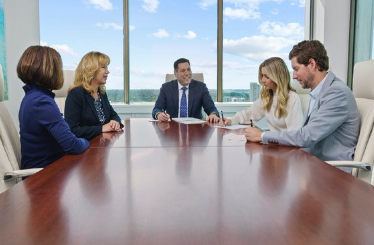 Photo of clients meeting in conference room